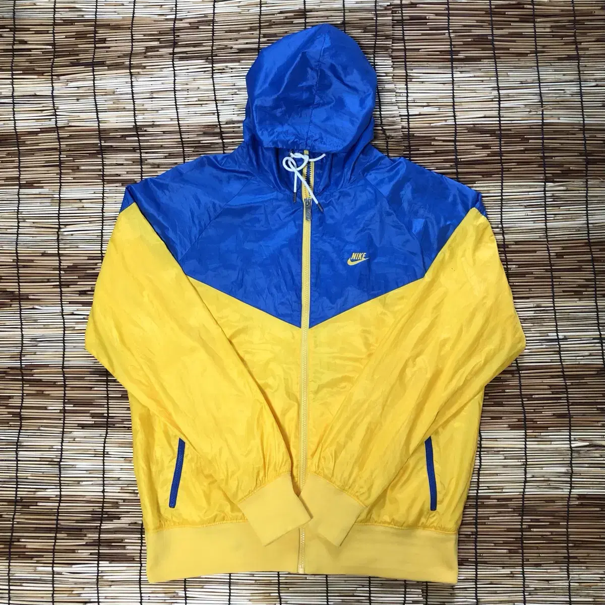 Yellow and blue nike windbreaker sales